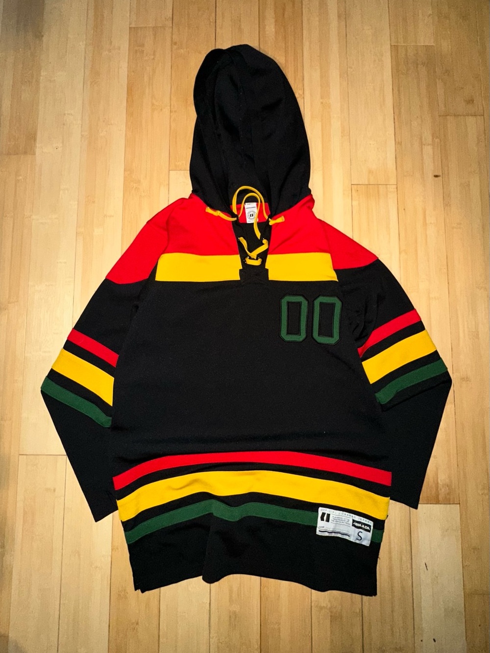 Black Hooded Pullover with Red, Yellow & Green Stripe Accents